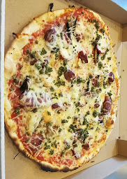 Photo n°11 de Pizza Baïa à Carnac (Pizzas à emporter)