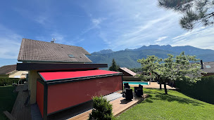 Photo n°4 de Athome Automatismes à Poisy (Magasin de stores et de rideaux)