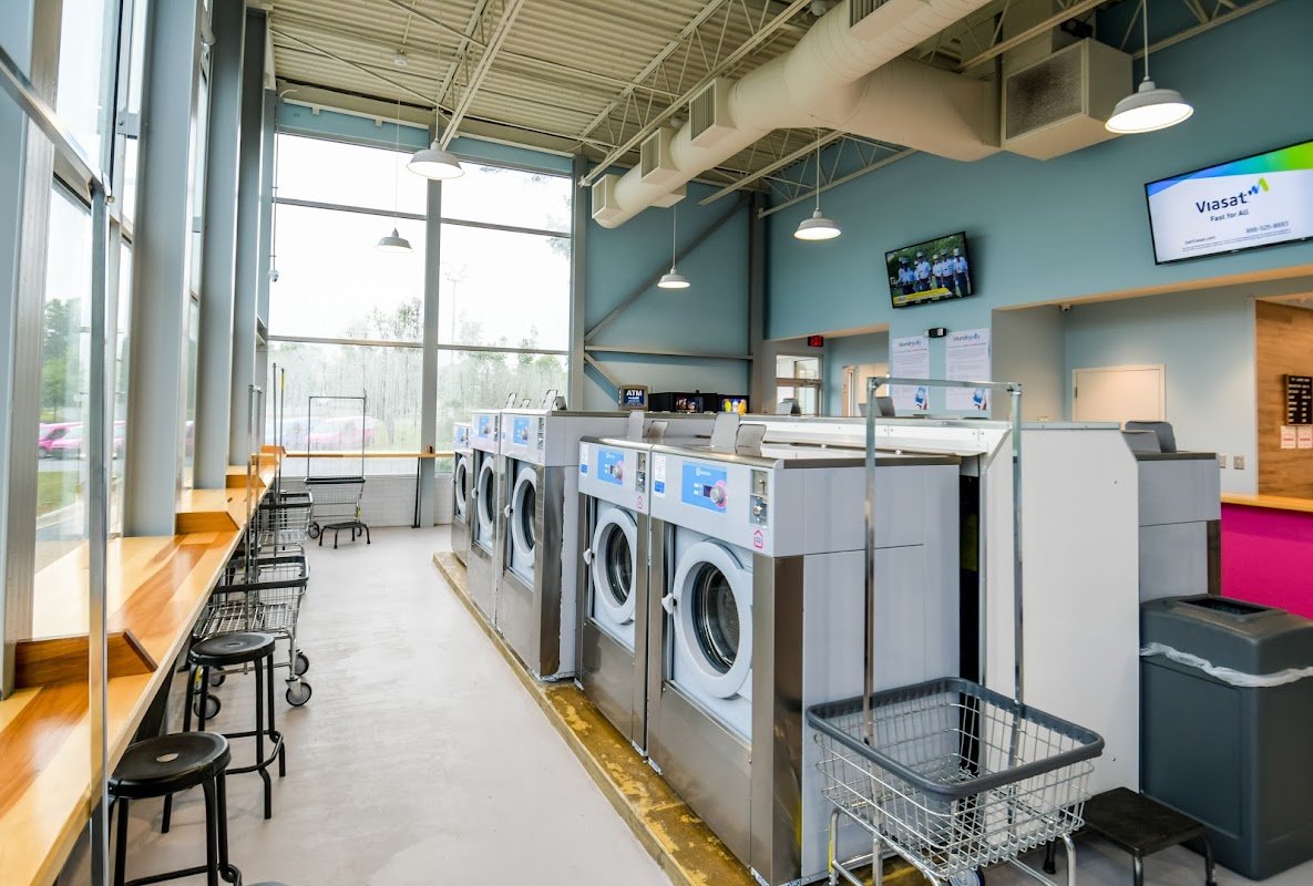 The Laundry Room facility with washing machines in Charlotte