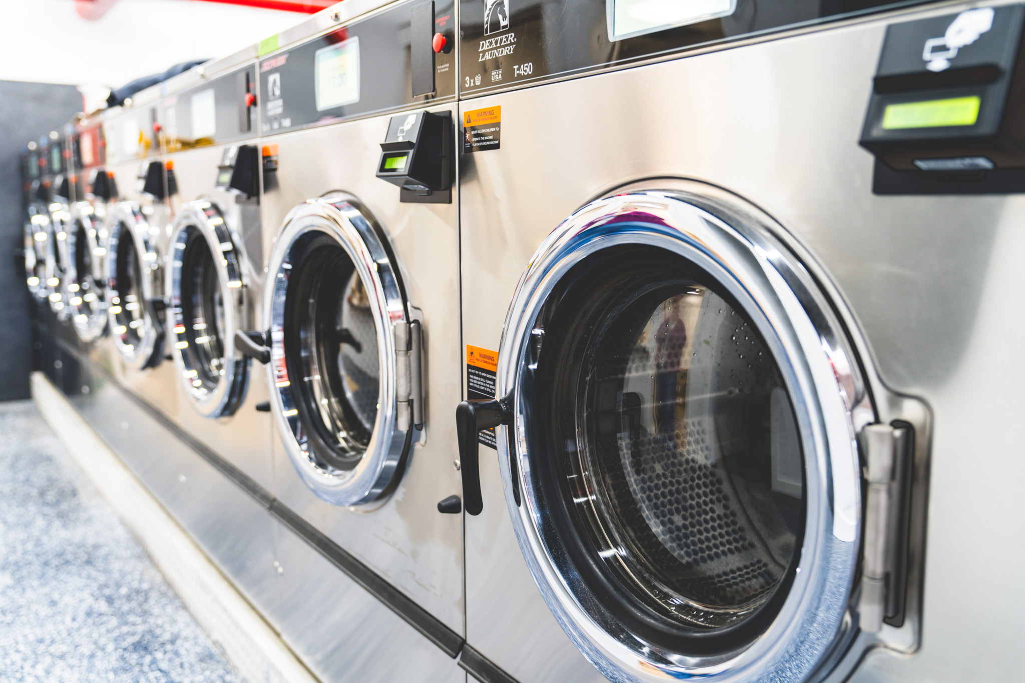Clean laundry equipment at Riverview Laundry in Damariscotta, ME