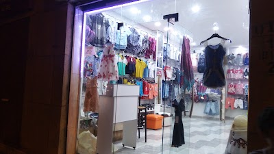 Photos of V&ecirc;tements & Chaussures Enfants, l'El&eacute;gance الاناقة
