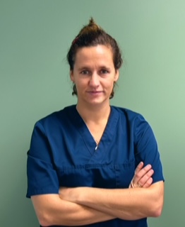 JUSTINE HELUAIN