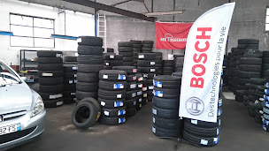 Photo n°5 de Garage & Co Garage de champagne à Champagne (Magasin de pneus)