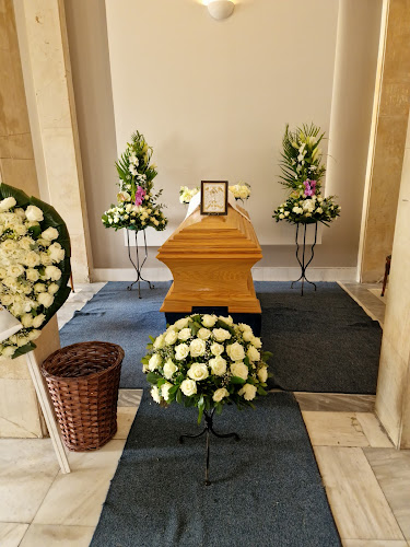 Γραφεία Τελετών Καρυώτη - Axriastos - Πειραιάς