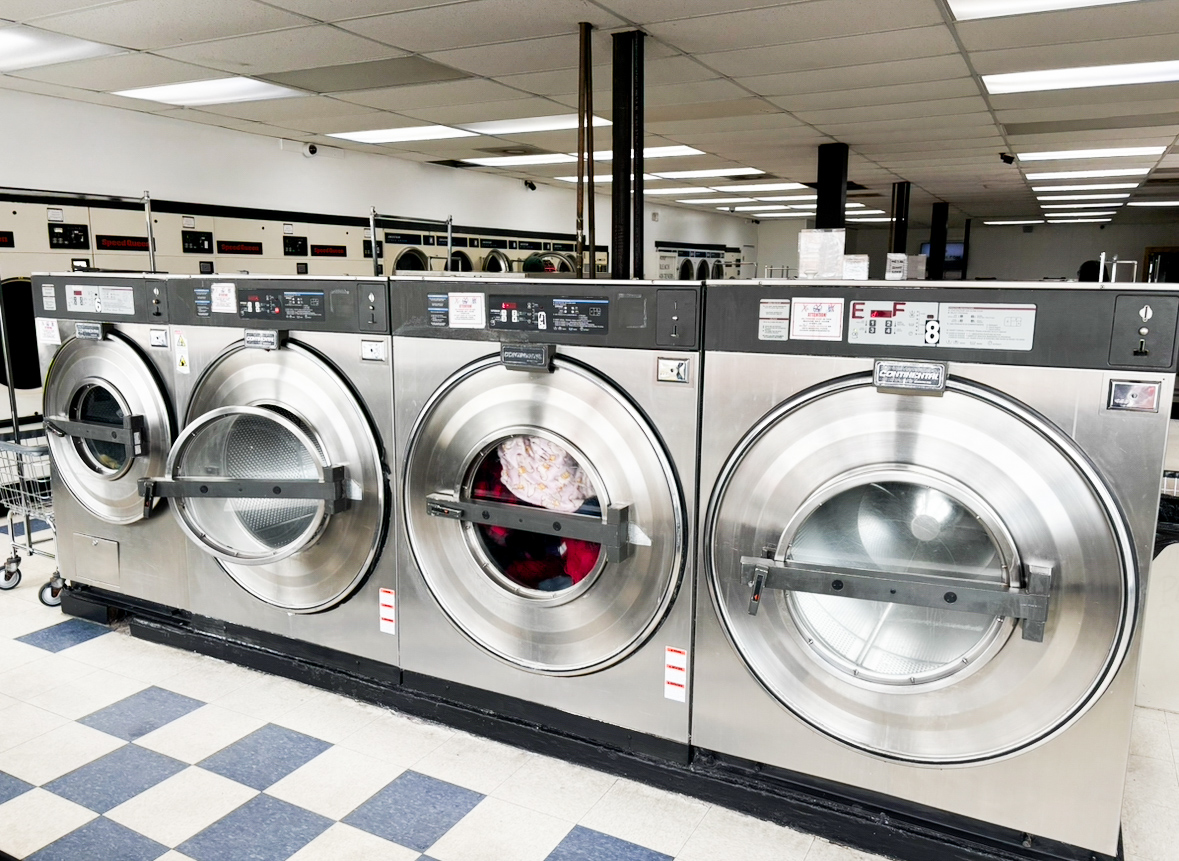 Clean laundry equipment at Laundry Center West in Green Bay, WI