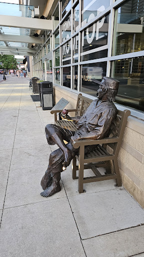Johnny Appleseed statue on bench - Thumbnail