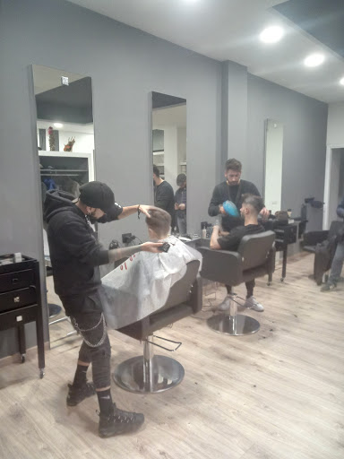 Rebel Hair & Barber Logo