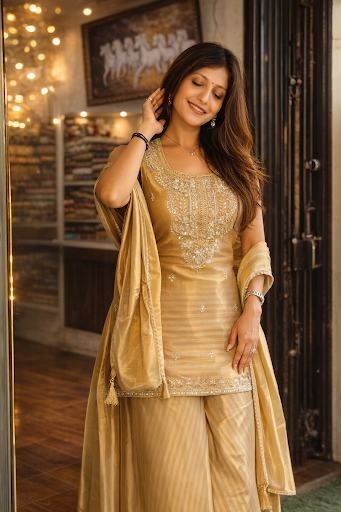 ✨ **Golden Tissue Top Trending Designer Suit – Available at Anuragi Fashion, Ahmedabad** ✨ post image