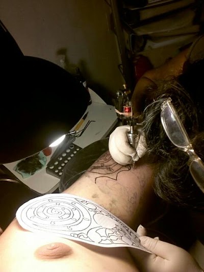 Photos of Tryme Tattoo