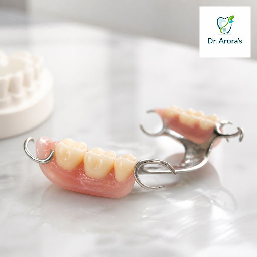 Restore your smile and enjoy confident chewing again with custom partial dentures at Dr. Arora's… post image