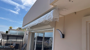 Photo n°11 de Dépannage portail 06, réparation porte de garage, installation volets roulant, remise en route store motorisé. à Antibes (Service de réparation)