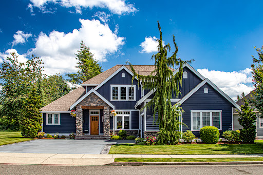 Windermere Real Estate/Whatcom Inc. - Loren VanCorbach Logo