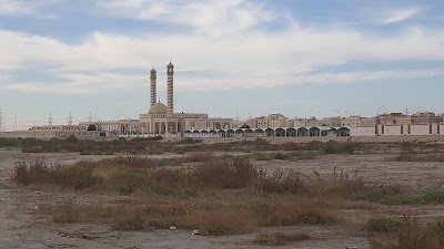 Photos of Imams Hadi and al-Kadhim mosque on them peace