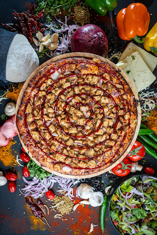 The Curry Pizza Company by null