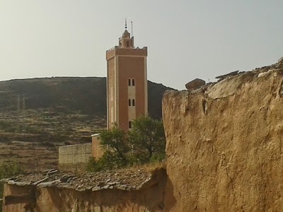 Photos of A mosque and a school antique Tmzkiduamn