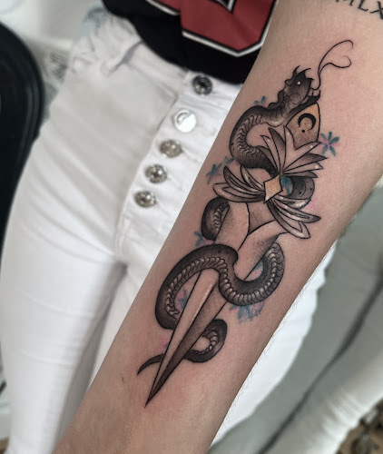 Nautilus Tattoo ( no piercings ) - Tatoueur