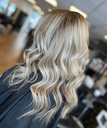 Photo n°16 de Aux Mille Et Une Coupes à Cormontreuil (Salon de coiffure)