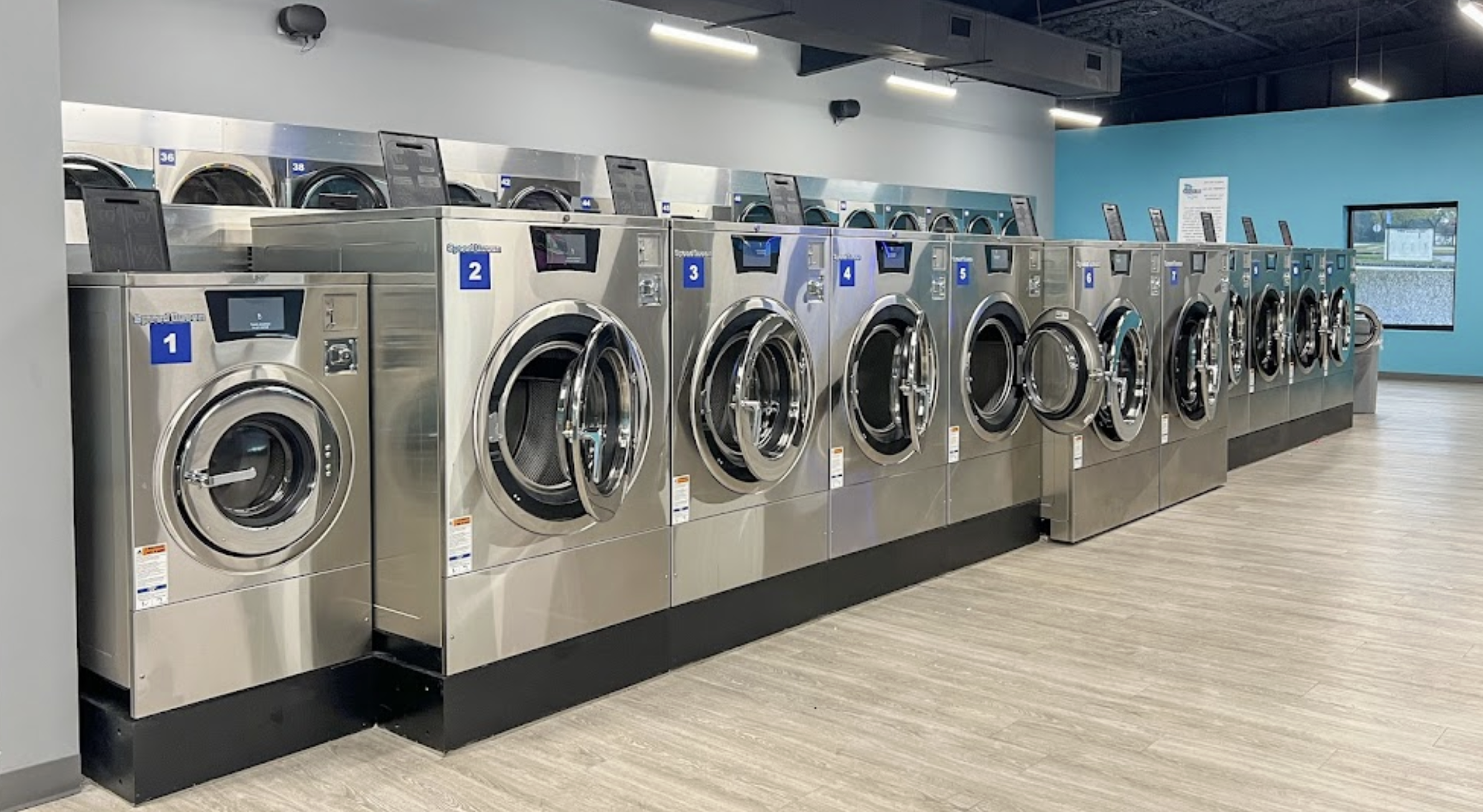 The Wash Room Laundromat storefront and entrance in Pensacola