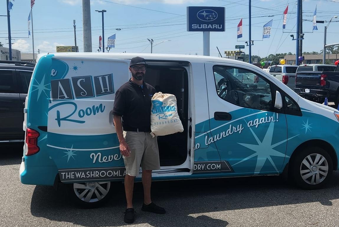 The Wash Room Laundromat storefront and entrance in Pensacola