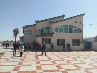 Photos of Taxi Stand Inter-Wilaya. Carob tree