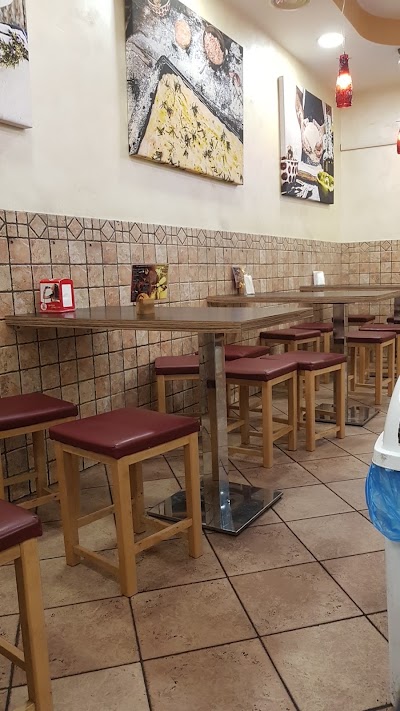 Photos of Mezzosacco pizza and diner