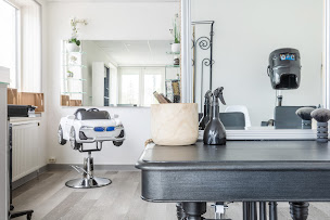 Photo n°2 de Delph' Coiff à Clessé (Salon de coiffure)