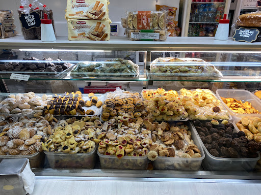 Traditional Tasty Treats celebrate with a cake
