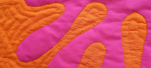 Amish Quilting by Hand - Thumbnail