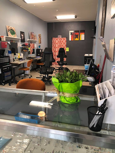Estilo Ink Tattoo Parlor