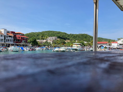 3 palmas. Embarcadero de Huatulco