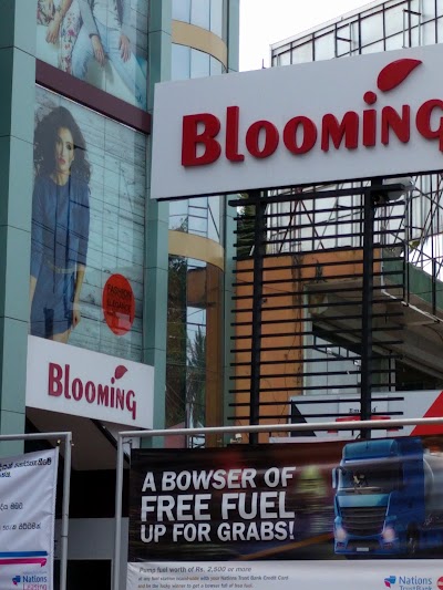 Photos of Blooming Fashions.