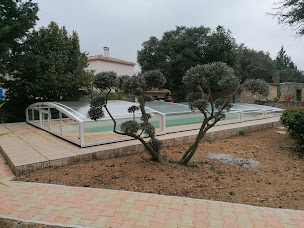 Photo n°18 de Fabricant installateur abris de piscine avec ou sans rail au sol Profils Abris France à Vauvert (Magasin de matériel pour piscines)