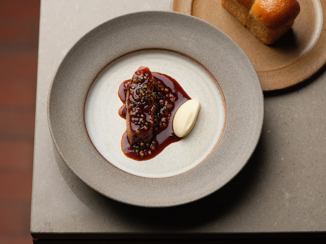 Skof a restaurant by Tom Barnes by null