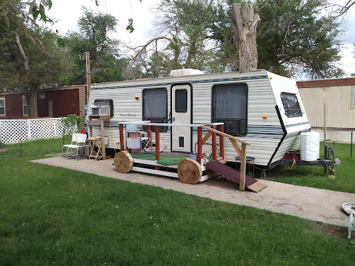 Paradise Greens Mobile Home Park Logo