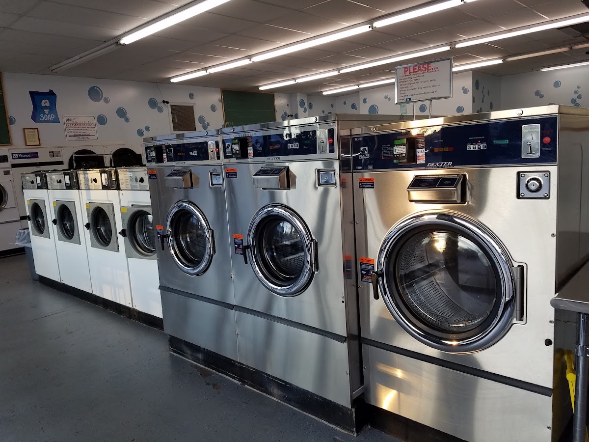 Drip N Dry Laundromat facility with washing machines in Denver