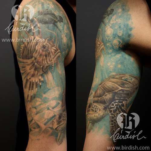 Birdish Tattoo | Pigmentierung | Kunst photo
