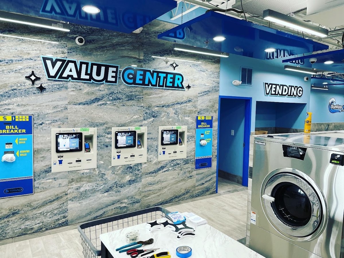 Clean laundry equipment at BlueWater Wash Laundromat in Wilmington, DE