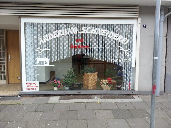 Änderungsschneiderei sirca photo