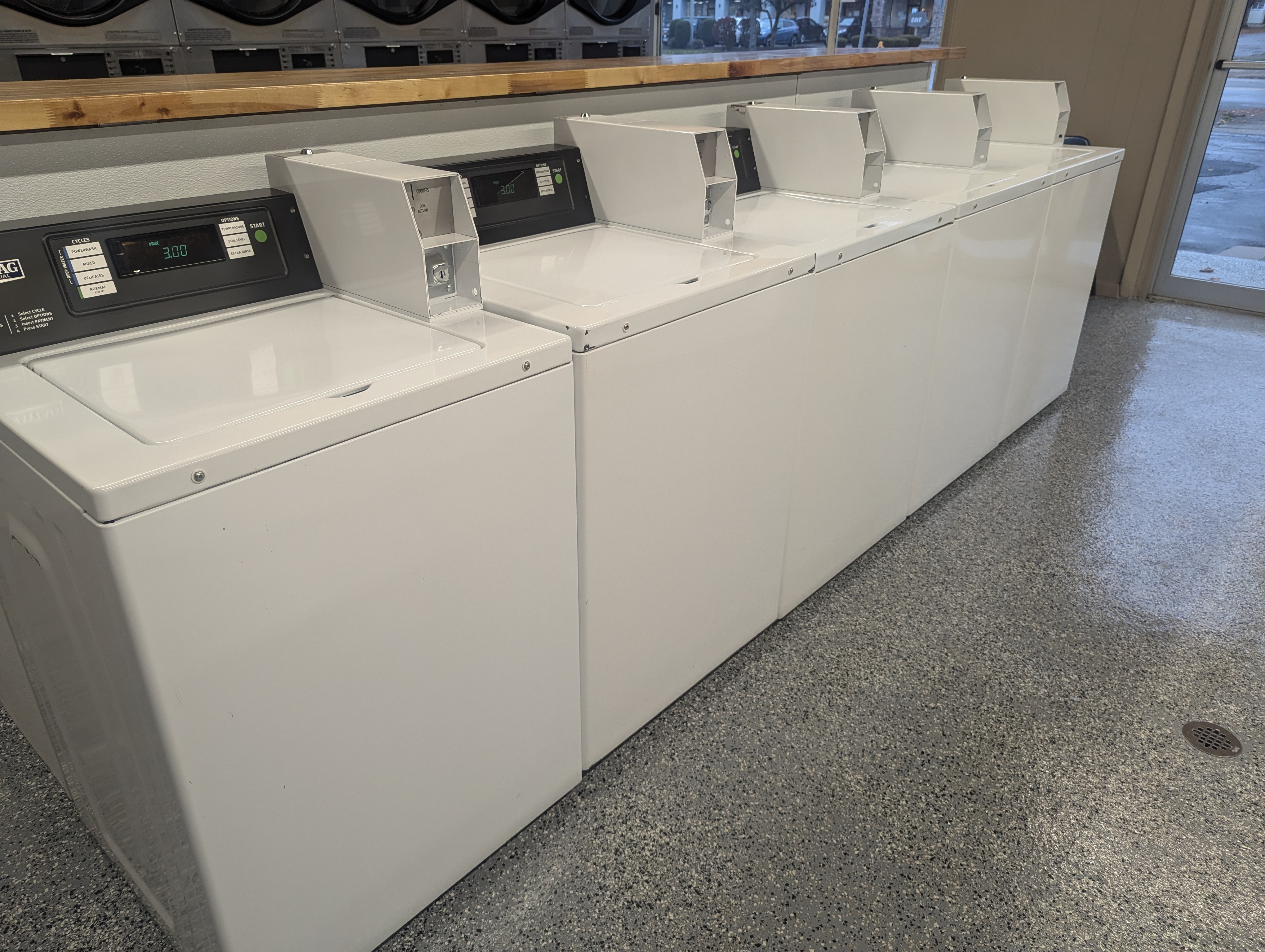 West State Laundry facility with washing machines in Olean