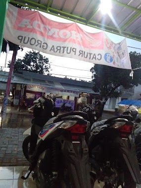 Pos Honda Caturcputra Jaya, Author: Ambon Alfian