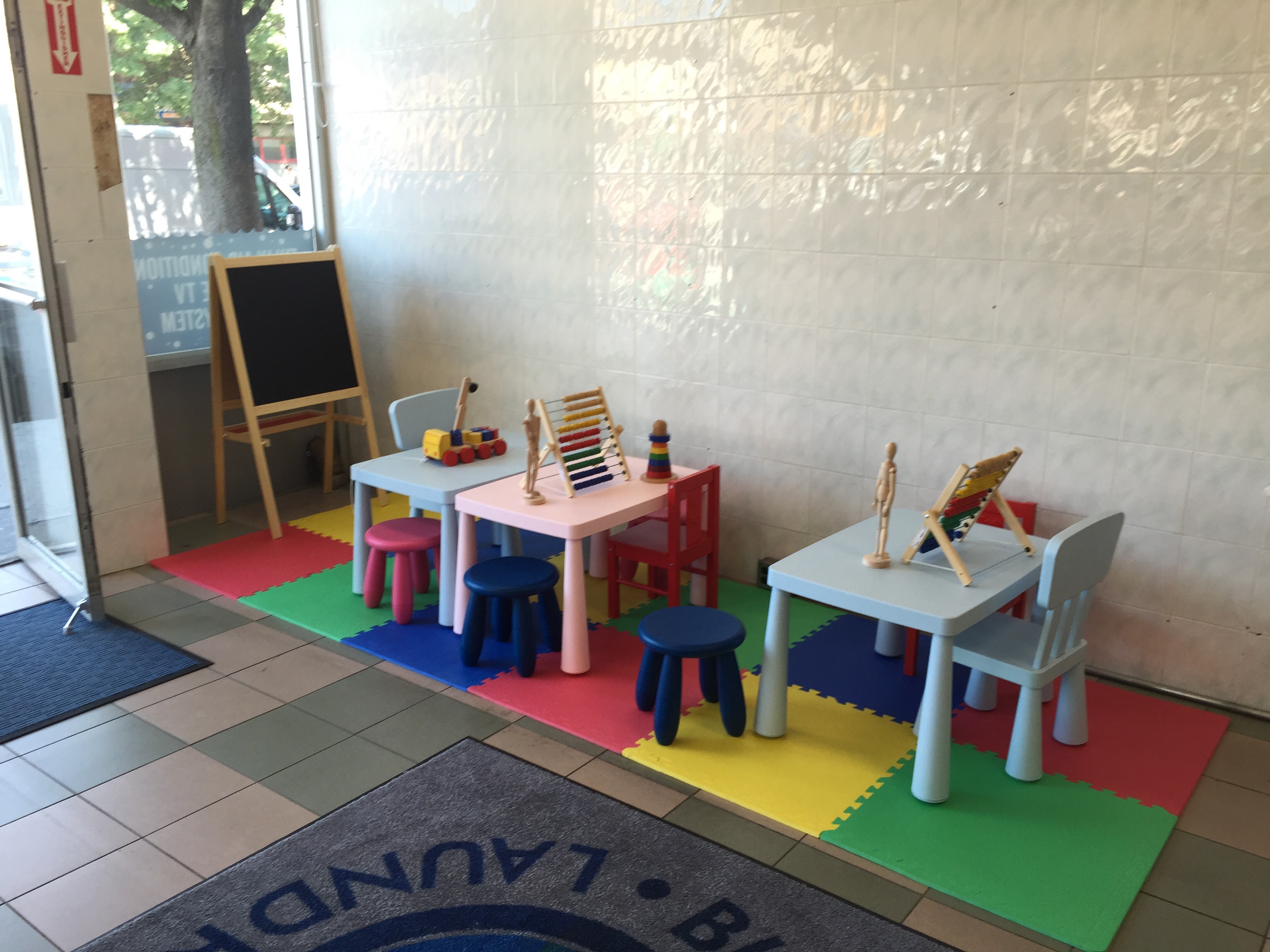 Self-service laundry at Bubbles & Suds Laundromat, Brooklyn, NY