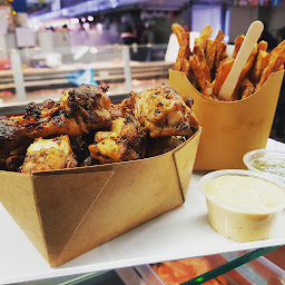 Photo n°5 de Le Roi du Poulet Boucané - Stand à Saint-Denis (Traiteur)