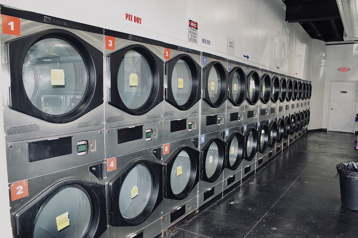 Clean laundry equipment at East 55th Laundromat in Cleveland, OH