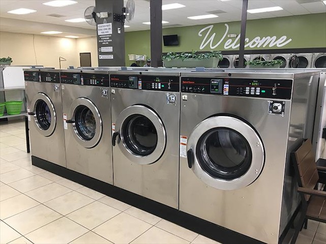 Clean laundry equipment at North Tryon Laundromat in Charlotte, NC