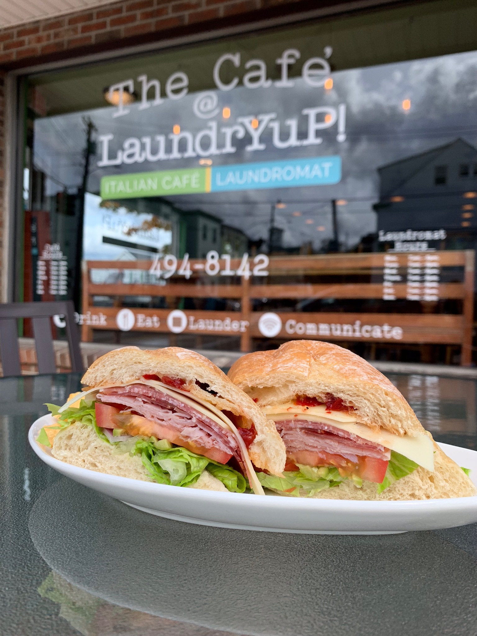 The Cafe @ LaundrYuP! storefront and entrance in Biddeford