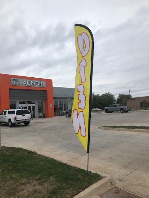 Clean laundry equipment at Spin City Laundry in Oklahoma City, OK
