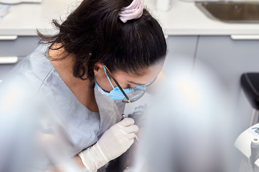Dr Camélia KASSOURI, Dentiste, Esthétique, Parodontie Logo