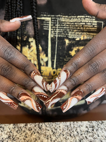 Pink Tiger Nails & Beauty by null