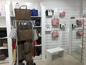 Photo n°9 de Maroquinerie STALRIC - Balaruc-Les-Bains à Balaruc-les-Bains (Magasin de maroquinerie)