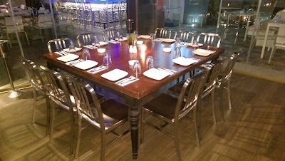 Photos of La Chaise Chairs & Tables